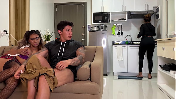 Naughty college girl fucks her mom’s boyfriend on the couch and she doesn’t notice