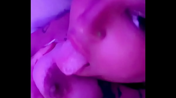 Horny bitch sucks her own tit